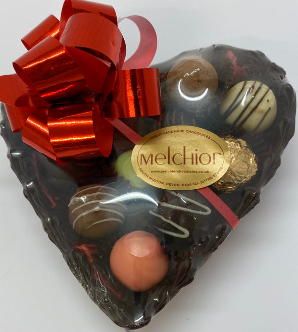 Milk chocolate heart filled with truffles