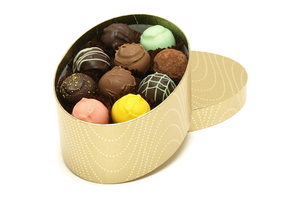 Oval gift box containing 20 luxury handmade chocolate truffles